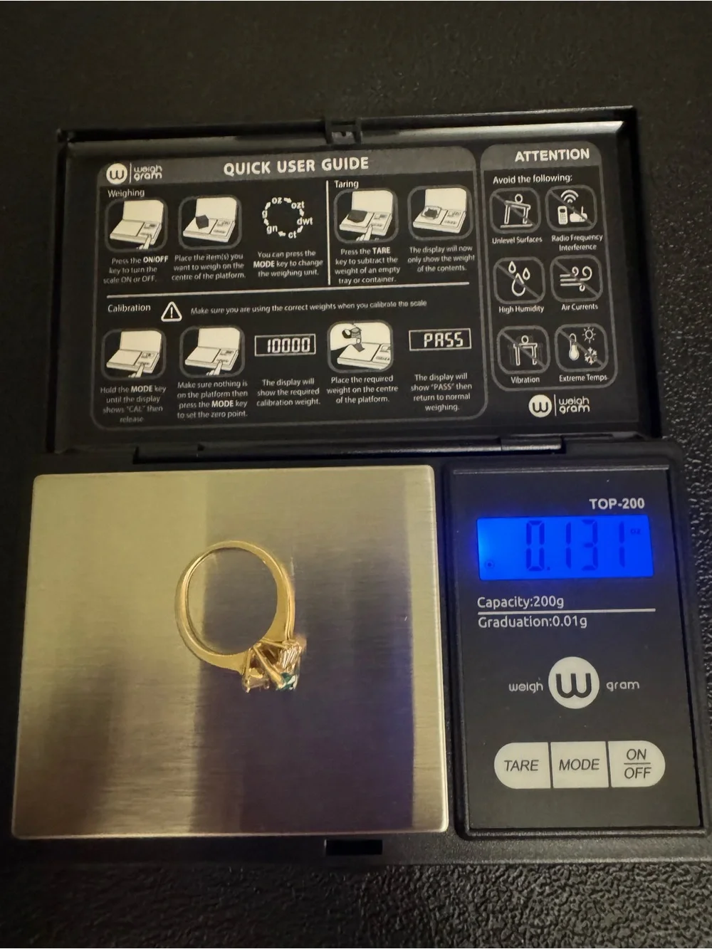 14kt Gold Emerald Ring with Baguette Side Diamonds